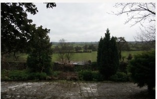 Existing view from the cottage towards the barn